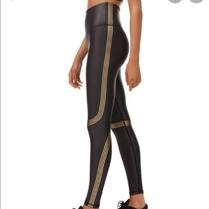 All Fenix tech gold leggings